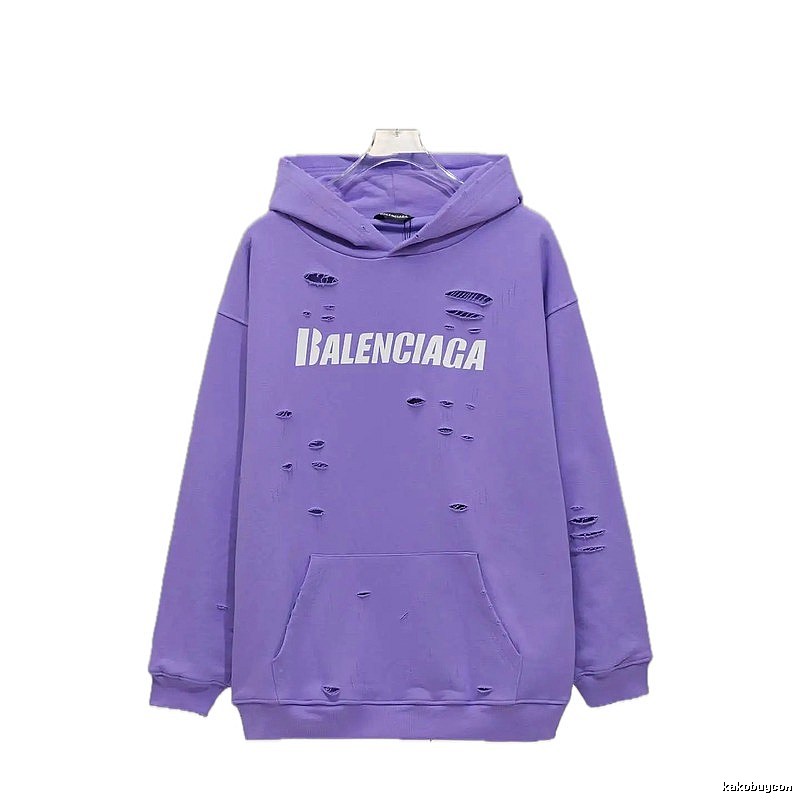 Balenciaga's ripped purple sweatshirt
