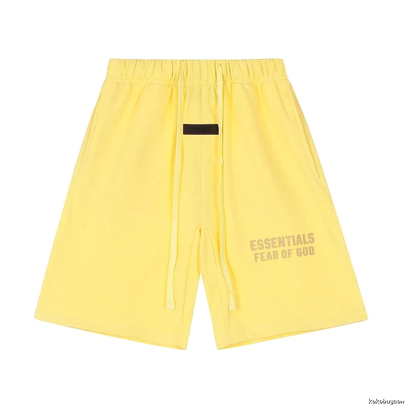 ESSENTIALS minimalist style yellow shorts