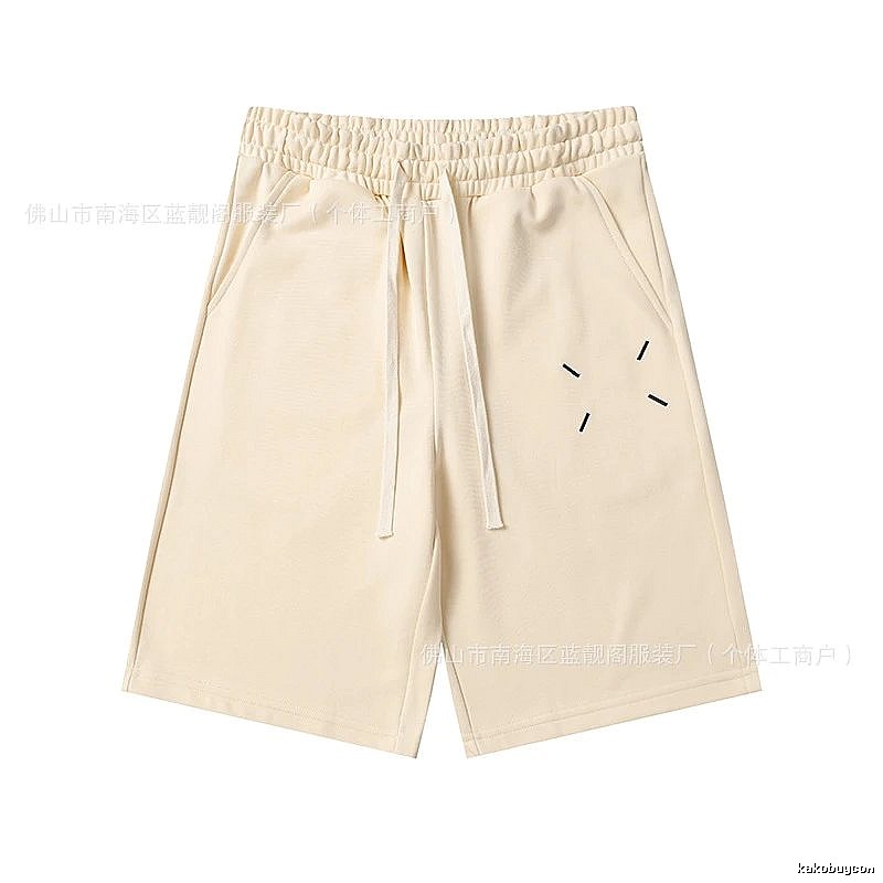 Maison Margiela minimalist style beige shorts