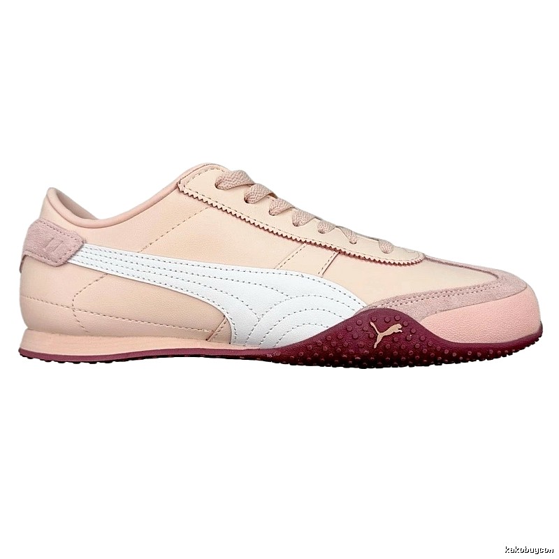 PUMA retro-style pink and white sports shoes